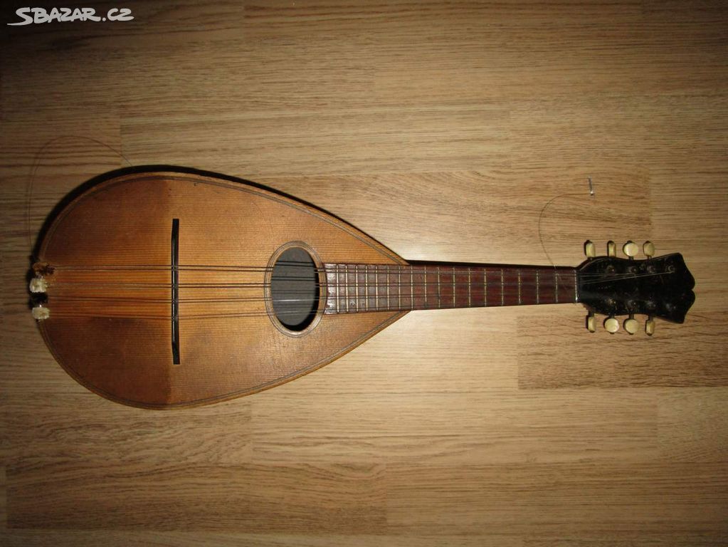Starožitná mandolína rok 1910 viz foto zde.