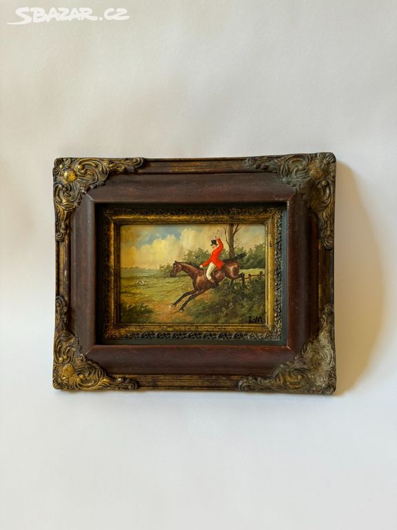 Obraz ve zlatém zdobeném rámu - jezdec na koni