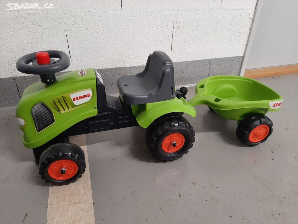 Traktor Baby Claas Zelený s přívěsem.