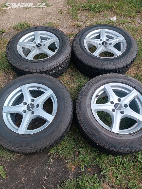 4y ALU disky (5x114,3) zimní pneu 215/70 r16