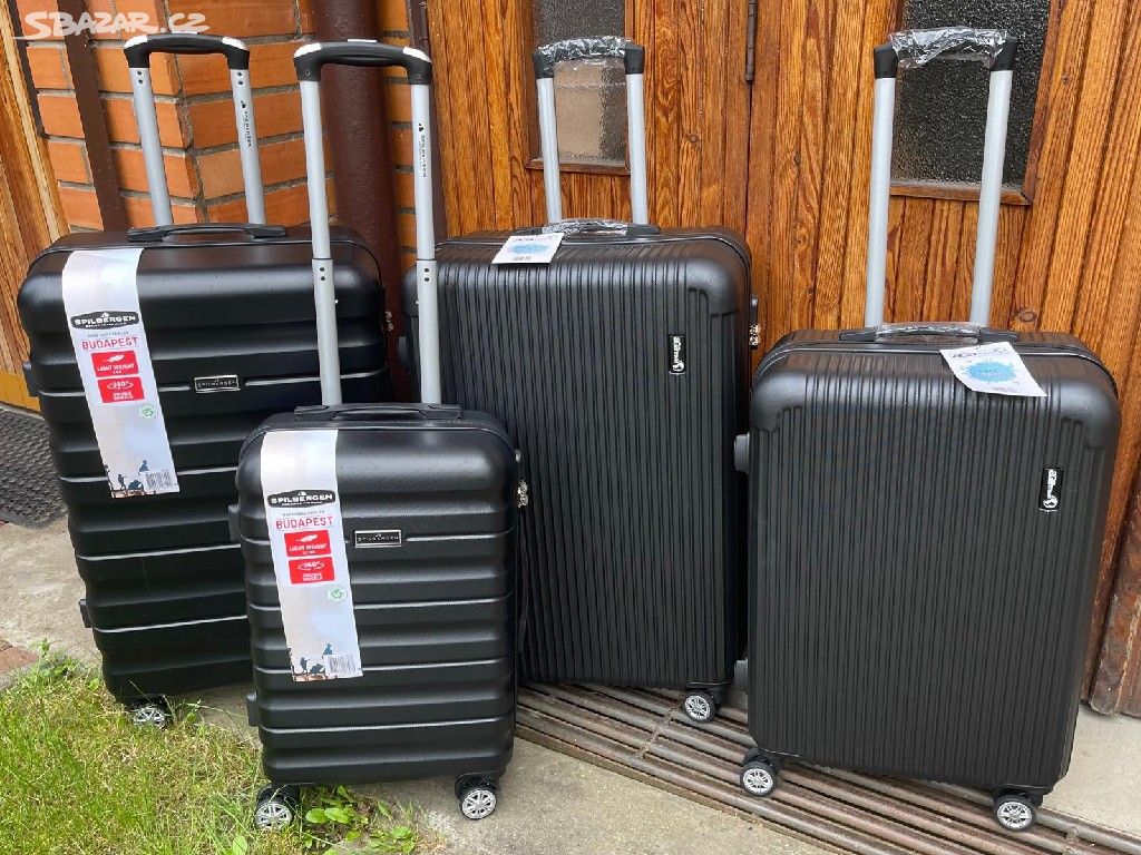 Cestovní kufry - různé velikosti, nové