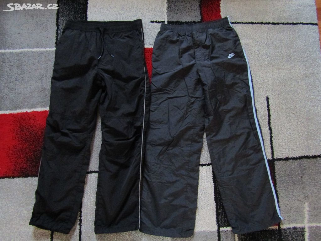 šusťákové kalhoty zn.Nike 146/152