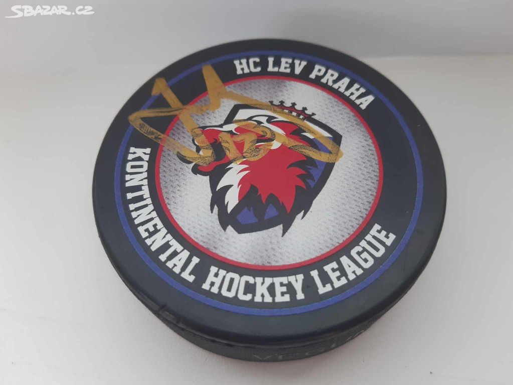 Hokejový puk HC Lev Praha podepsaný