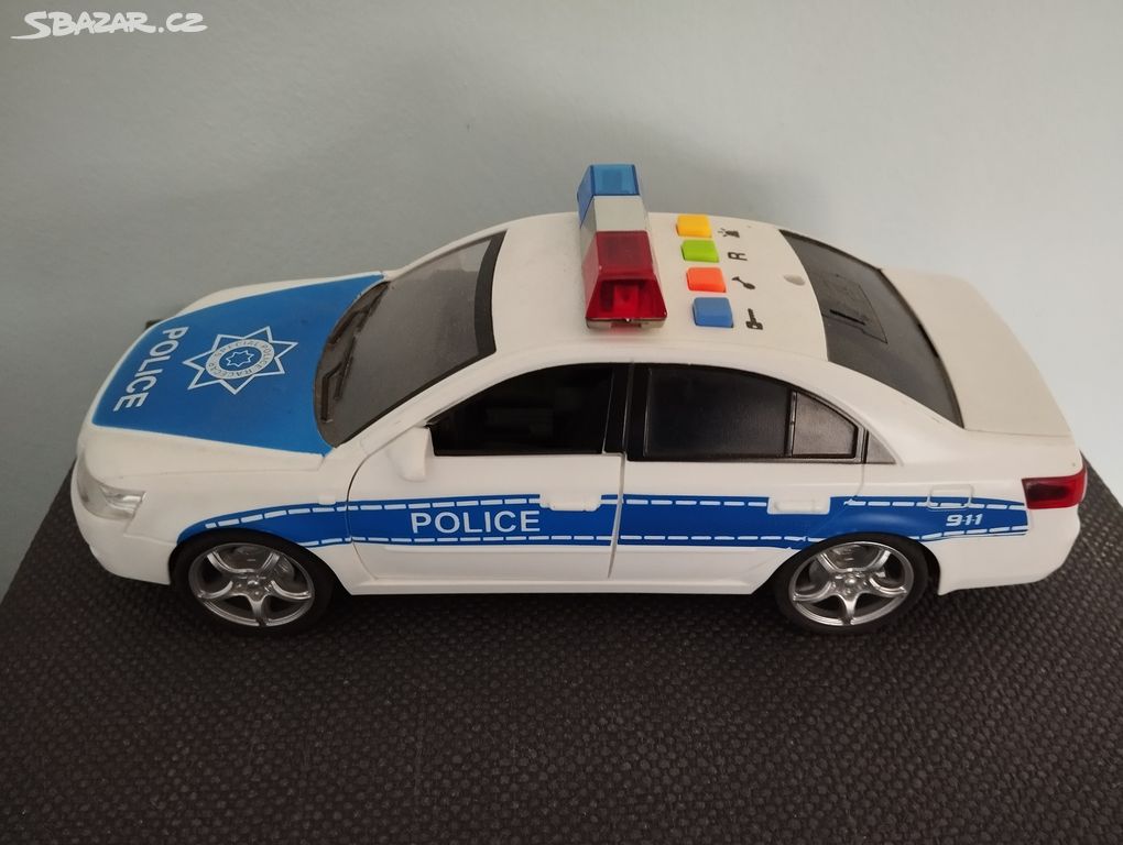 Policejní auto s efekty 24 cm