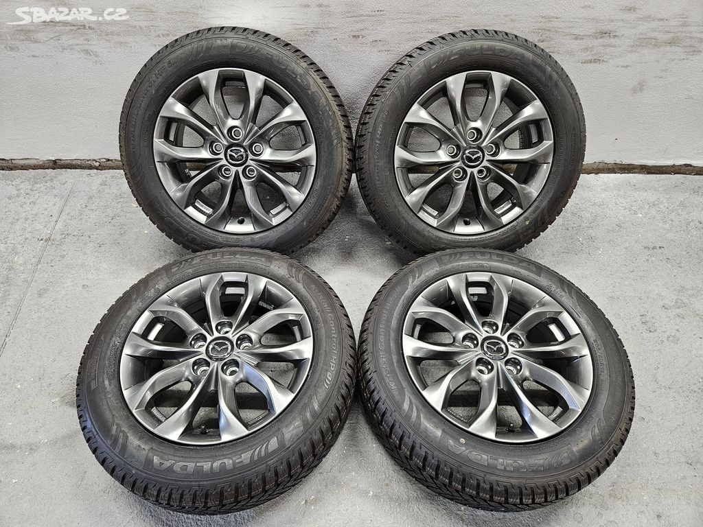 16 Mazda ET50 6.5J 5x114.3 + Fulda 205/60 R16 92H