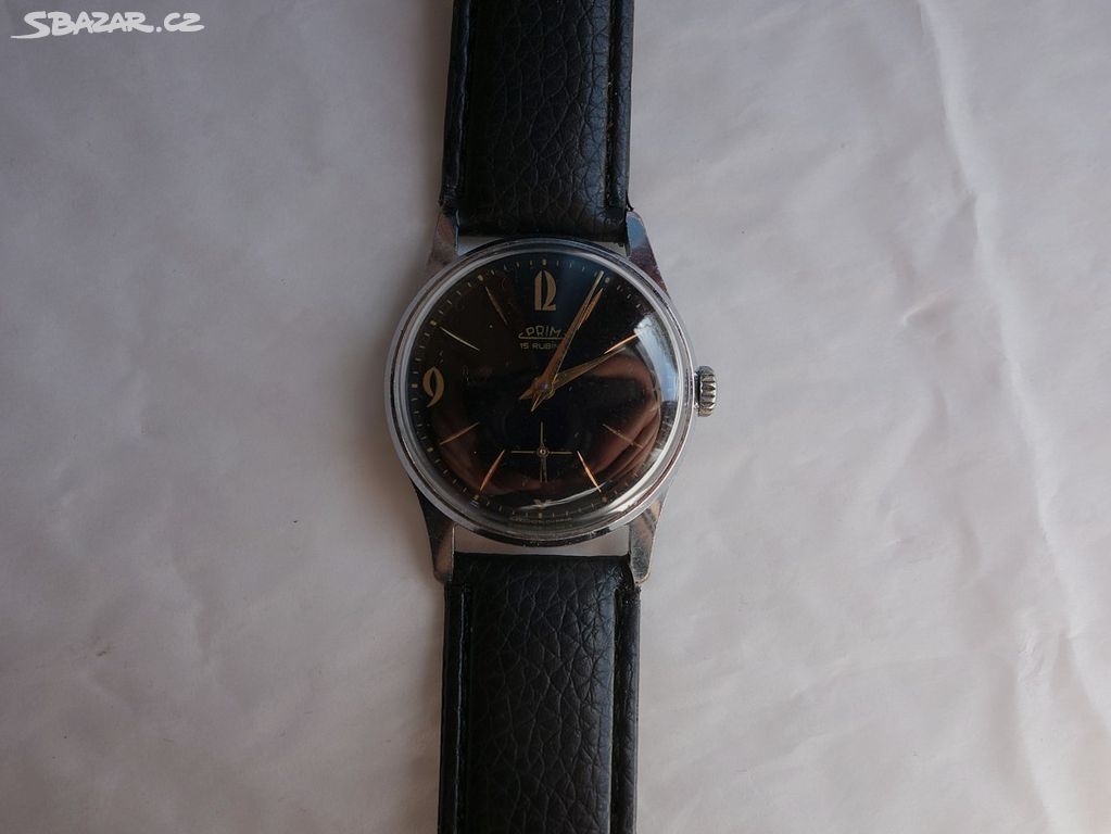 Pěkné, staré, zachovalé hodinky Prim Brusel černé