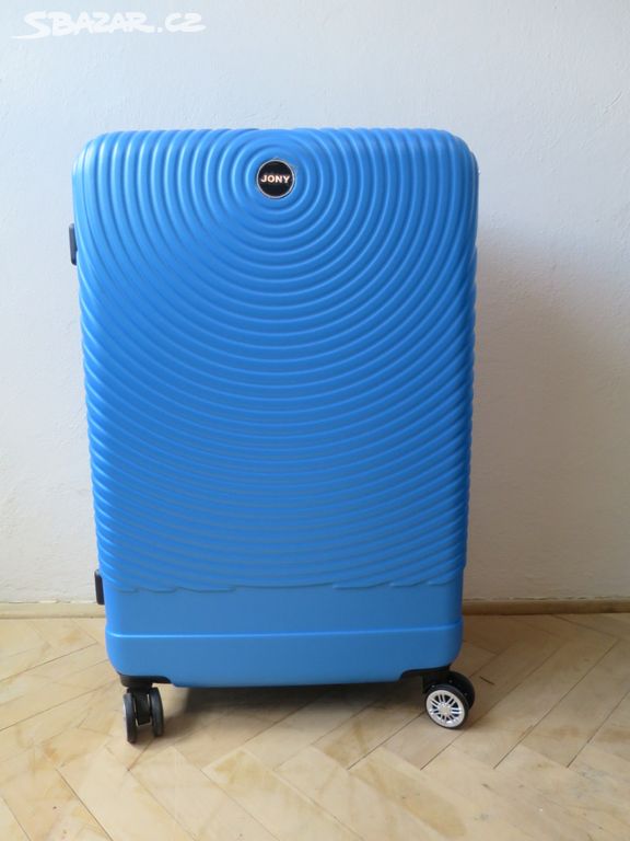 Nový velký modrý kufr na kolečkách