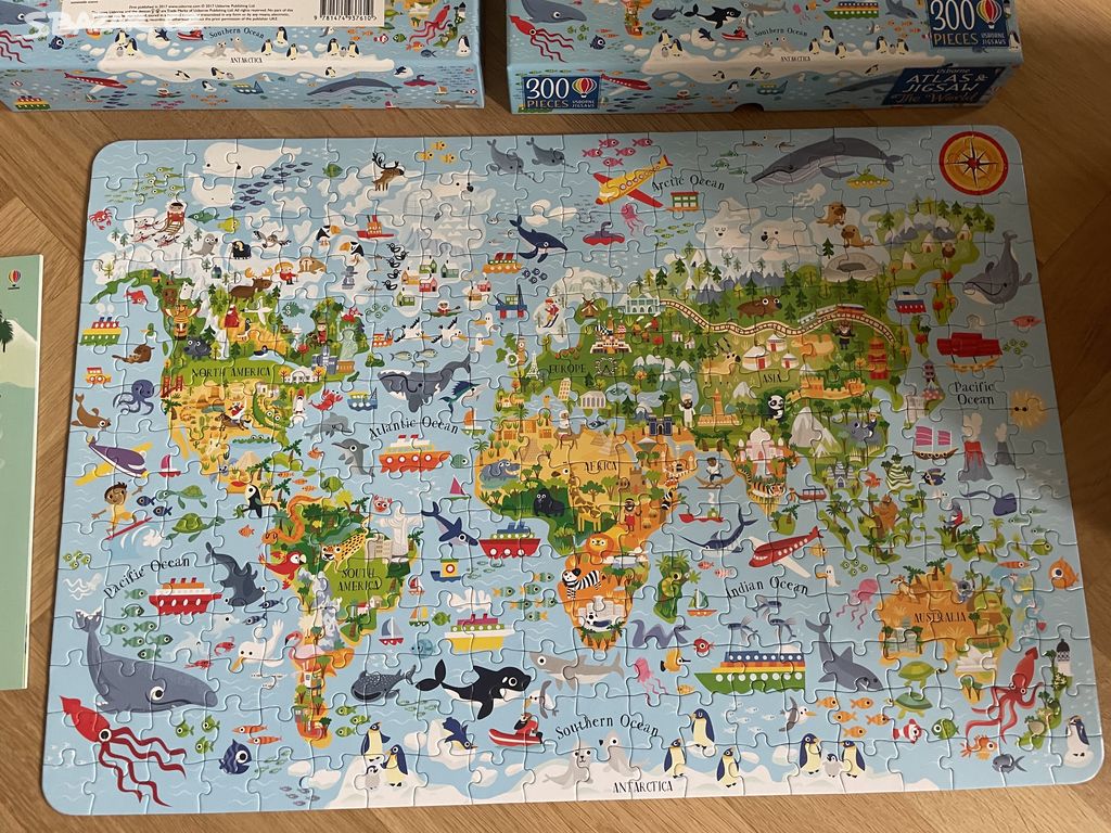 Nové puzzle a kniha samolepek Země světa Usborne