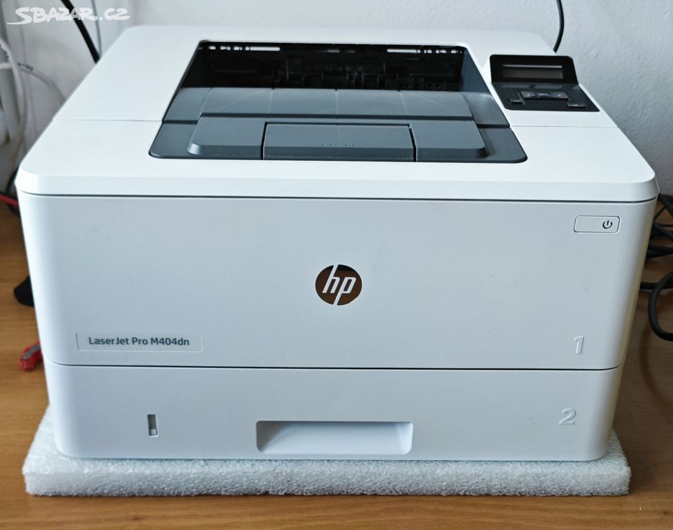 HP m404dn + originál toner 50%