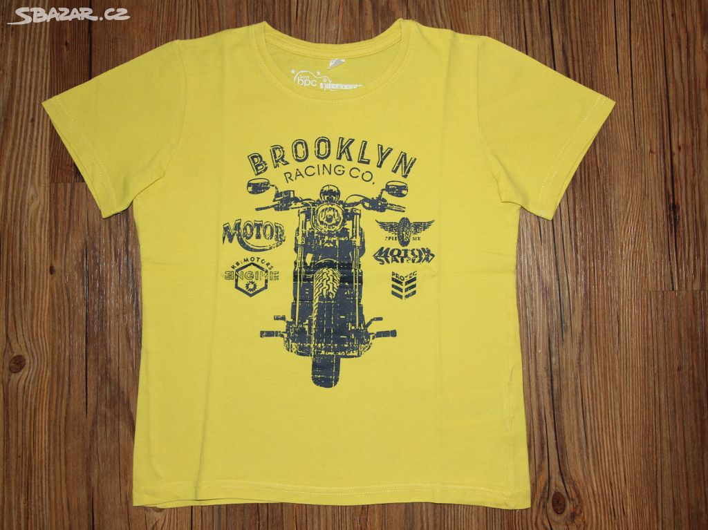 žluté tričko s motorkou vel. 128/134