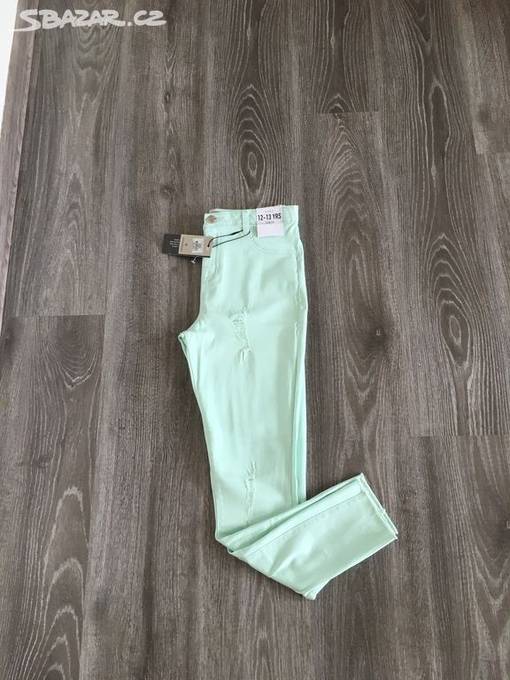 Nové. Mint skinny rifle s dírami Primark vel 158