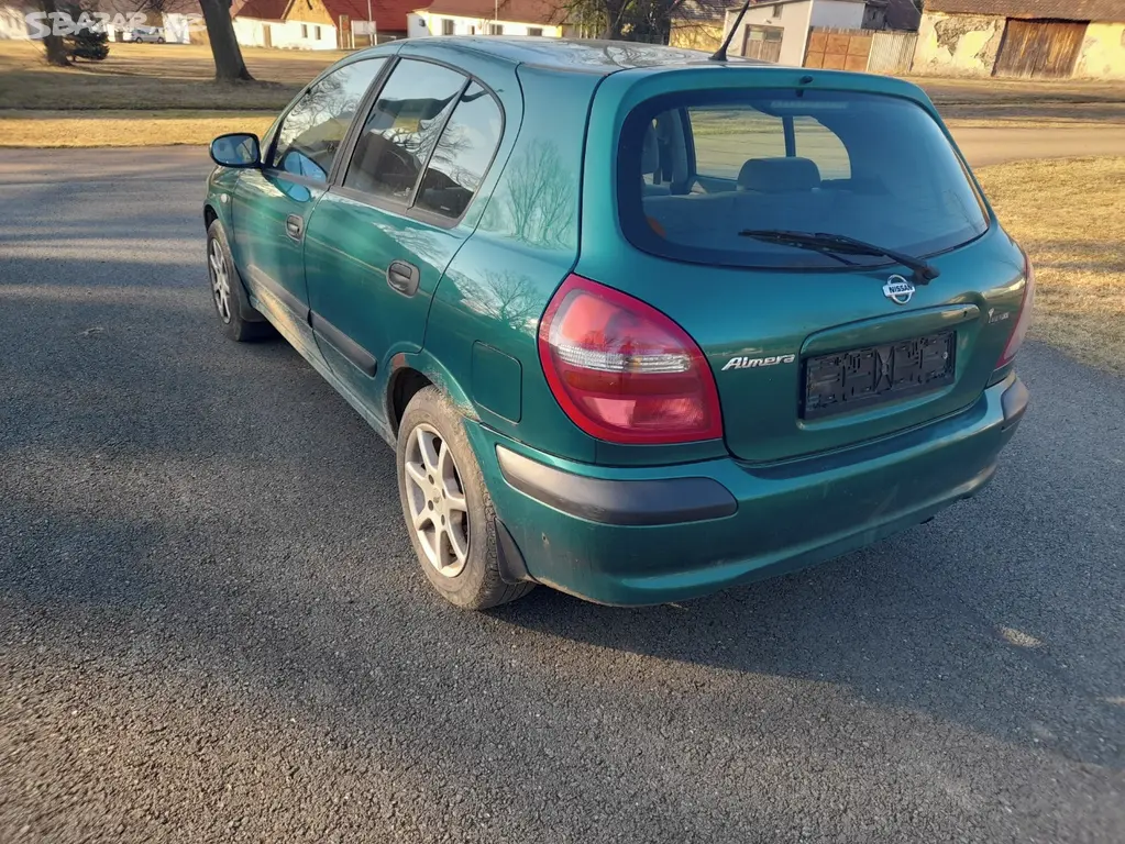 Nissan almera 1,5 66kw benzín - fotka 2