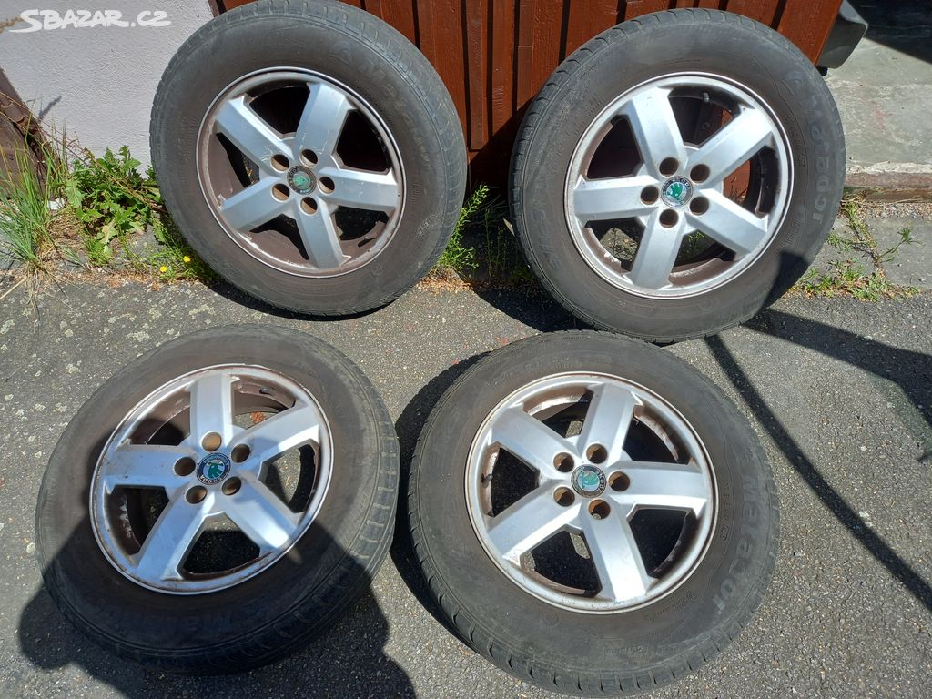 alu kola škoda 5x100 ET38 pneu 195/65 5mm,3mm