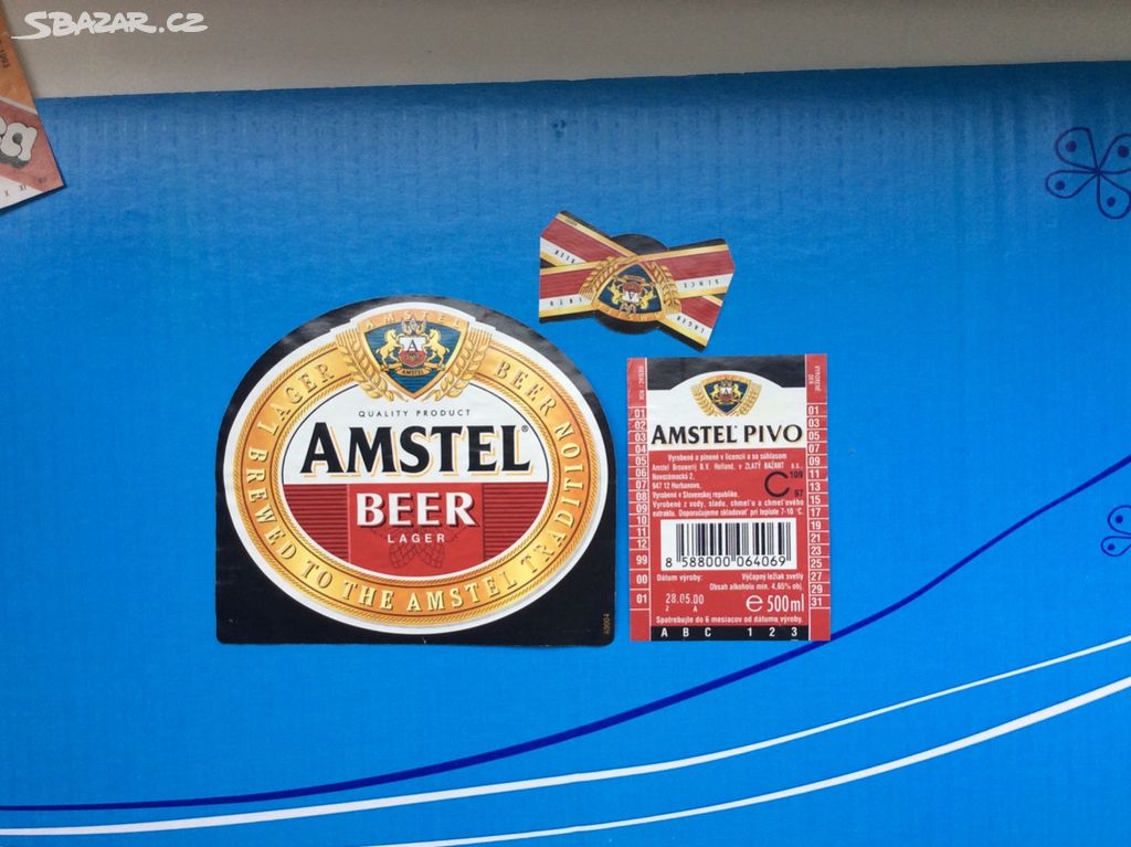 Pivní etiketa Amstel v licenci Zlatý bažant