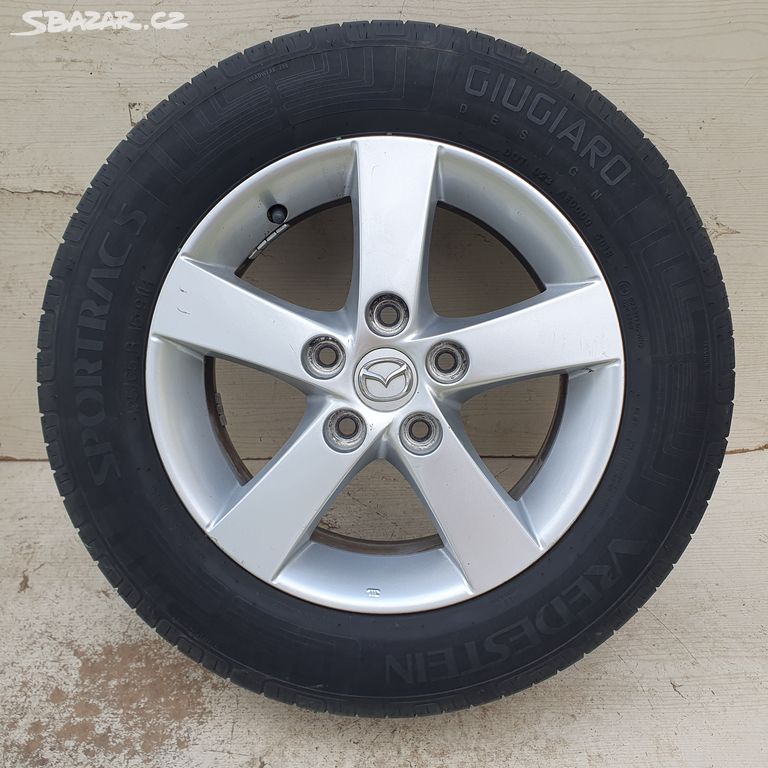 Alu kola Mazda 15" 5x114,3, letní Vredestein - 75%