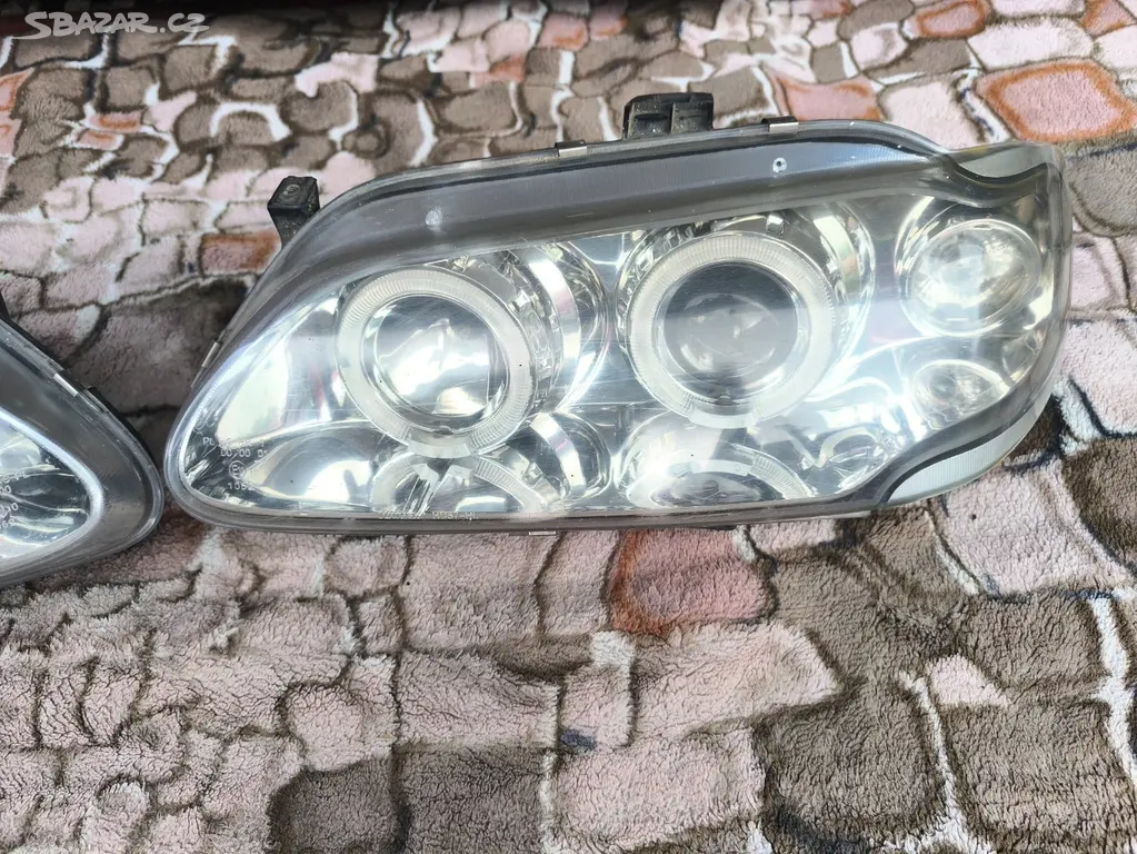 Náhled: Přední světla Renault Megane 96-99 AngelEyes chrom