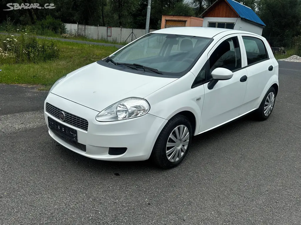 Fiat Punto grande 1.2i, r.2009, klima, 1.maj., stk