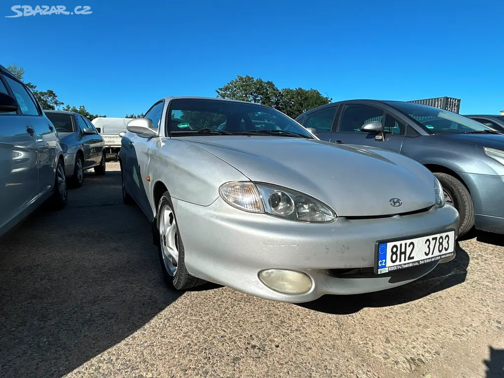 Hyundai Lantra Coupé 1.6 84 kW 197tisic,2 sady kol - fotka 3