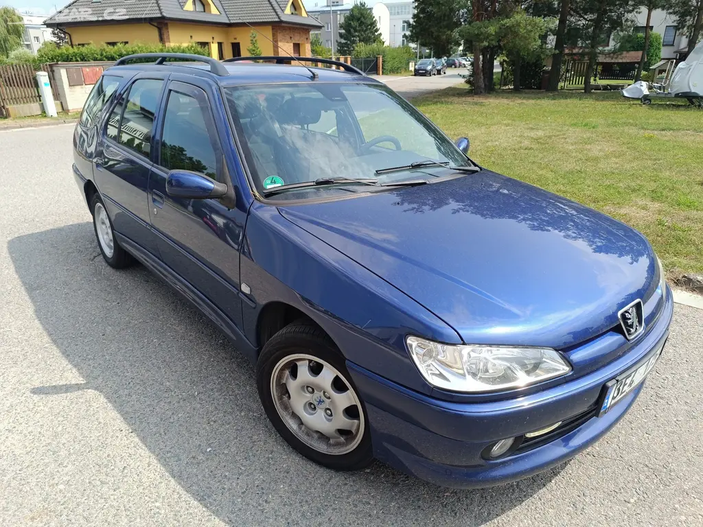 Peugeot 306 Combi 1.4i  garážovaný, 2 sady kol